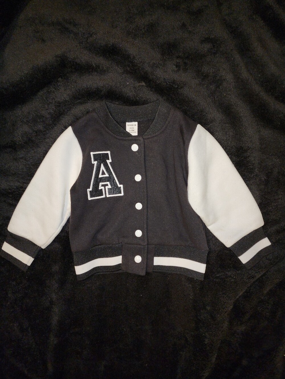 2 baby Varsity Jackets